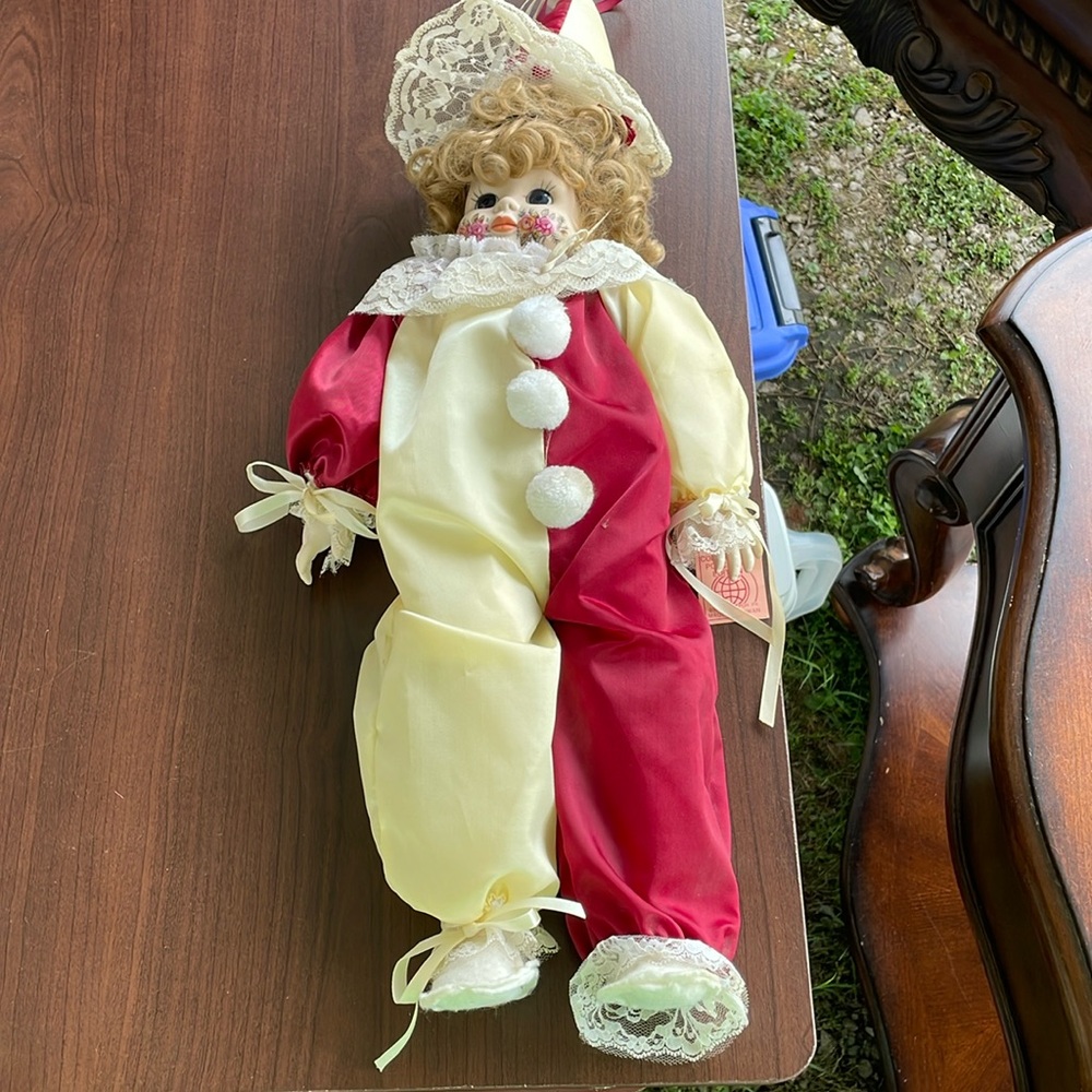 Doll with porcelain head, feet, and hands